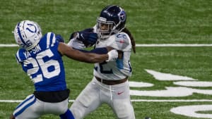 Derrick Henry stiff-arms Rock Ya-Sin during Week 12 win over Colts